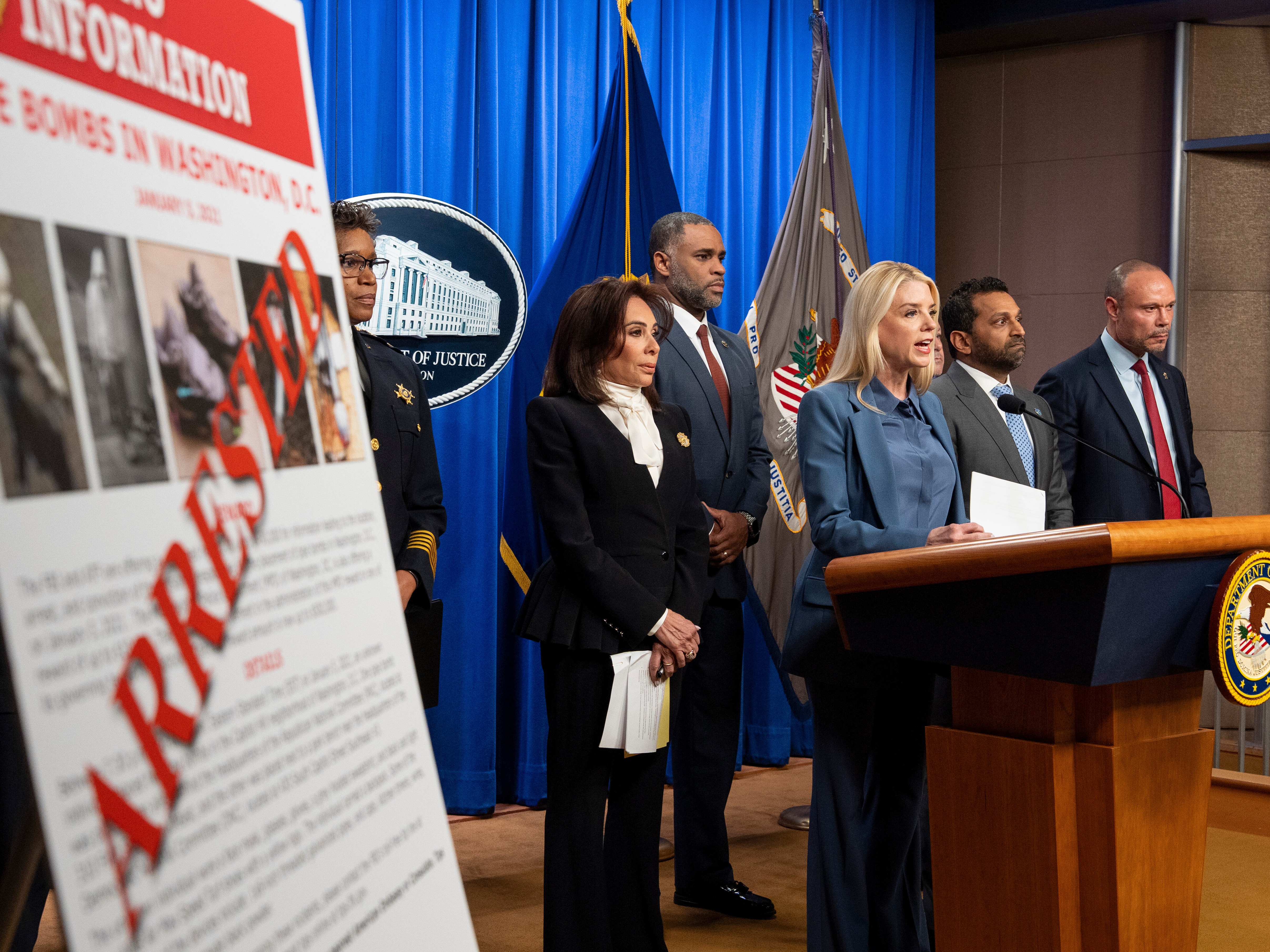 caption: Attorney General Pam Bondi, third from right, Washington Metropolitan Police Chief Pamela Smith, left, U.S. Attorney Jeanine Pirro, ATF Special Agent in Charge of Washington Anthony Spotswood, FBI Director Kash Patel, and FBI deputy director Dan Bongino speak during a news conference at the Department of Justice, Thursday, Dec. 4, 2025, in Washington.