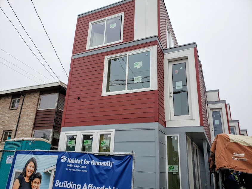 caption: A Habitat for Humanity affordable housing project under construction in Seattle's Loyal Heights neighborhood on Wednesday, December 15, 2021.