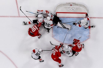 Team Switzerland takes on Team Russia in the Beijing 2022 Winter Olympic Games.