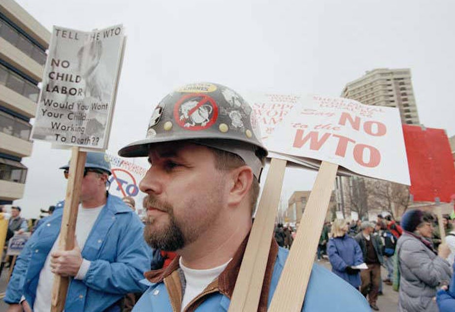 caption: Union workers marching at WTO protest, Seattle, December 3, 1999