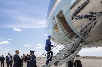 caption: President Biden boards Air Force One at Peterson Air Force Base in Colorado Springs, Colo. on June 1, 2023, after attending the 2023 United States Air Force Academy Graduation Ceremony.