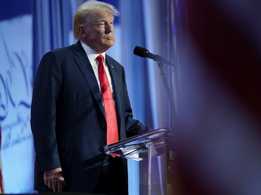 caption: Former President Donald Trump speaks at a Moms for Liberty meeting in Philadelphia on June 30.