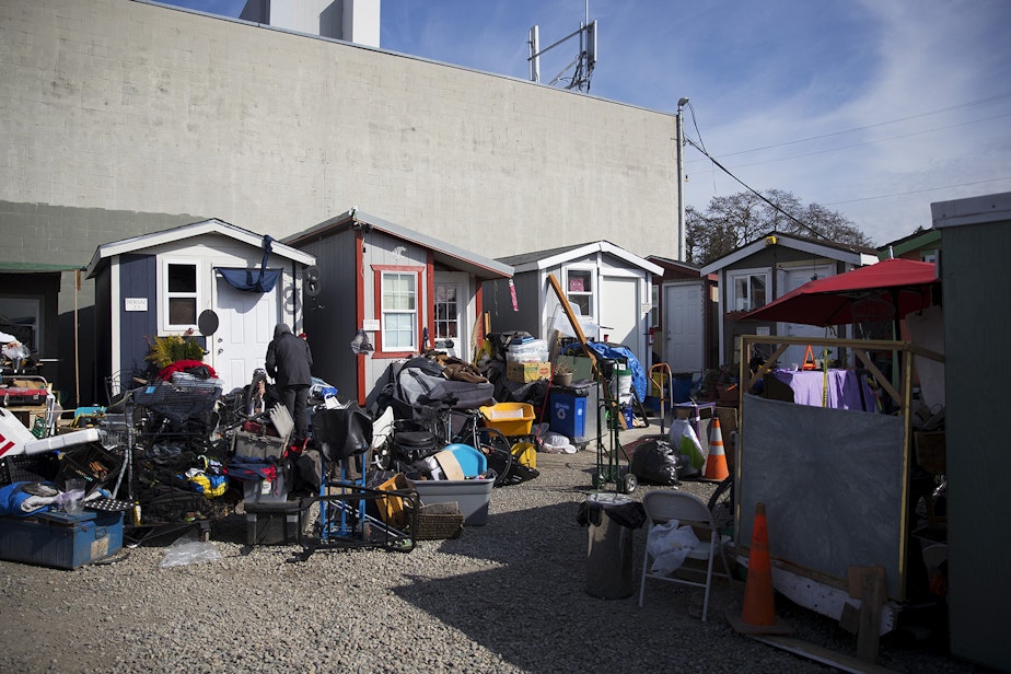 caption: Tiny homes are shown on Wednesday, March 21, 2018, at the Licton Springs Tiny House Village on Aurora Avenue North in Seattle. 