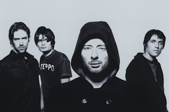caption: Radiohead circa 2000. Singer Thom Yorke says that as much as the albums <em>Kid A</em> and <em>Amnesiac</em> channel the dread that loomed over their moment, they are also full of hope that another world is possible.
