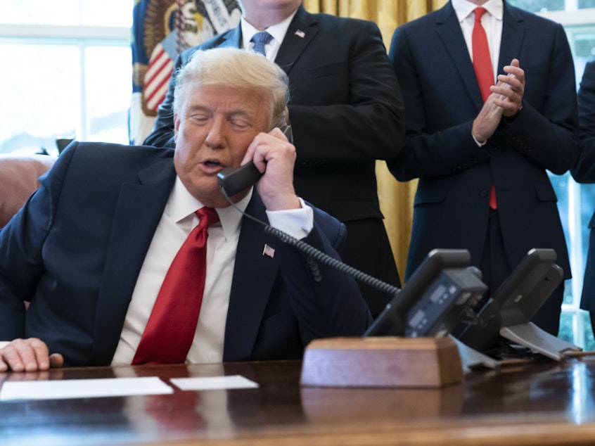 caption: President Donald Trump's phone call on Saturday with Georgia Secretary of State Brad Raffensperger spurred debates this week over the call broke the law.