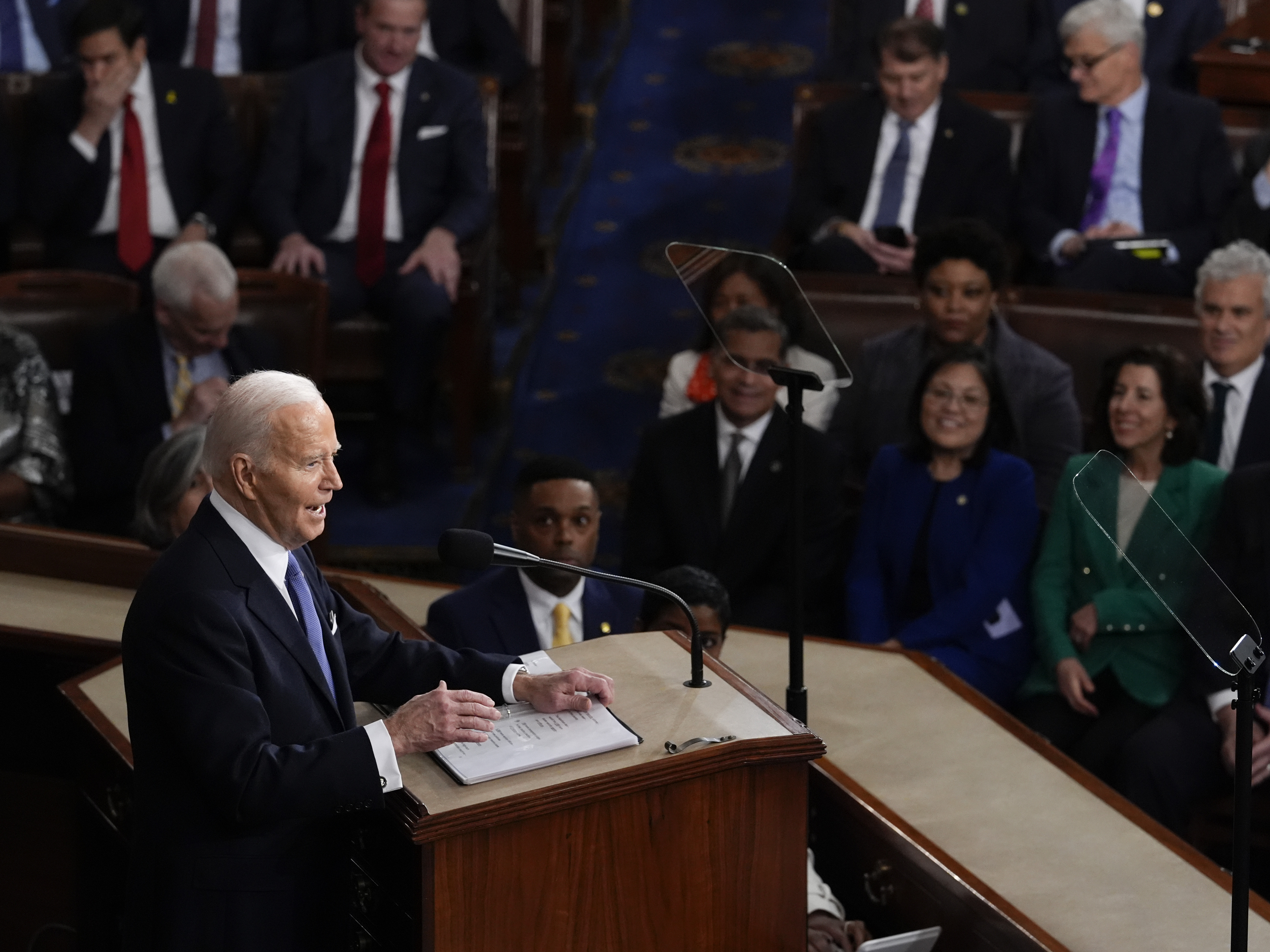 caption: President Joe Biden delivers his State of the Union address to a joint session of Congress, at the Capitol in Washington, Thursday, March 7, 2024.