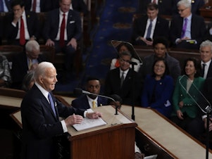 caption: President Joe Biden delivers his State of the Union address to a joint session of Congress, at the Capitol in Washington, Thursday, March 7, 2024.