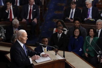 caption: President Joe Biden delivers his State of the Union address to a joint session of Congress, at the Capitol in Washington, Thursday, March 7, 2024.