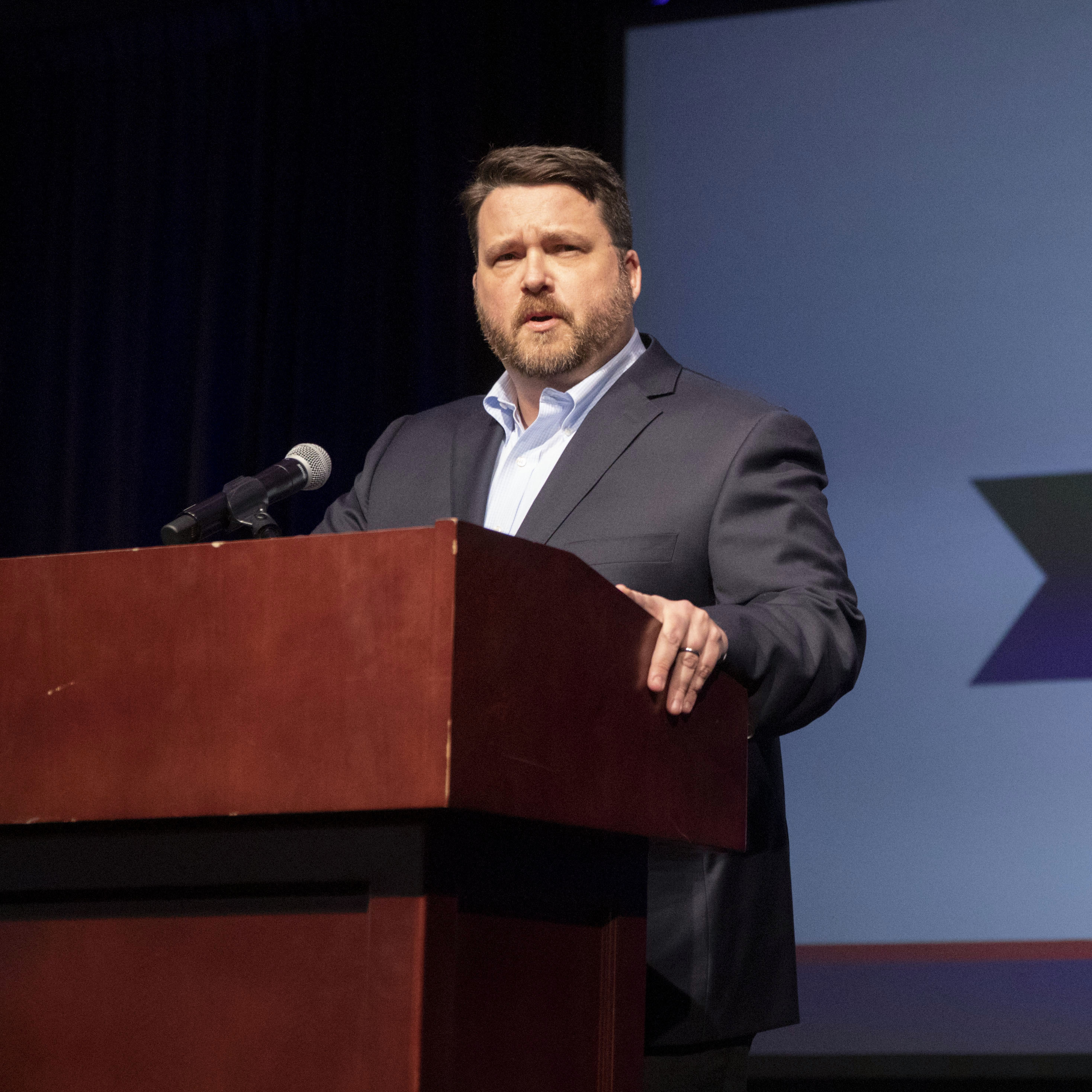 caption: Troy Price, chairman of the Iowa Democratic Party, speaks the day after the chaotic caucus process.