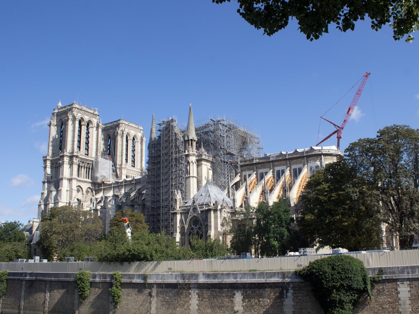 caption: Work on Paris' Notre Dame cathedral continues, following a devastating fire in April.