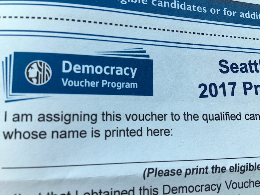 caption: Seattle first used democracy vouchers for its elections in 2017.