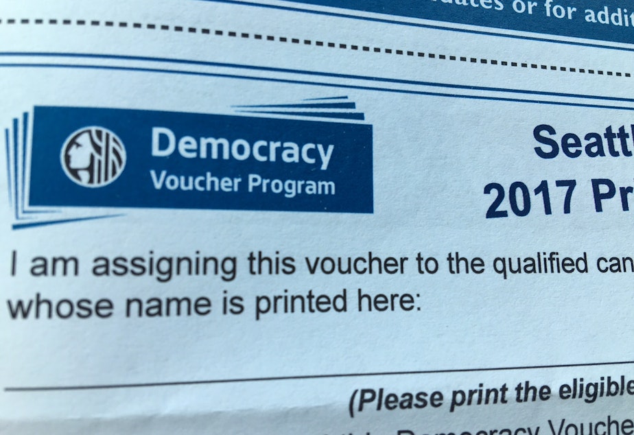 caption: Seattle first used democracy vouchers for its elections in 2017.