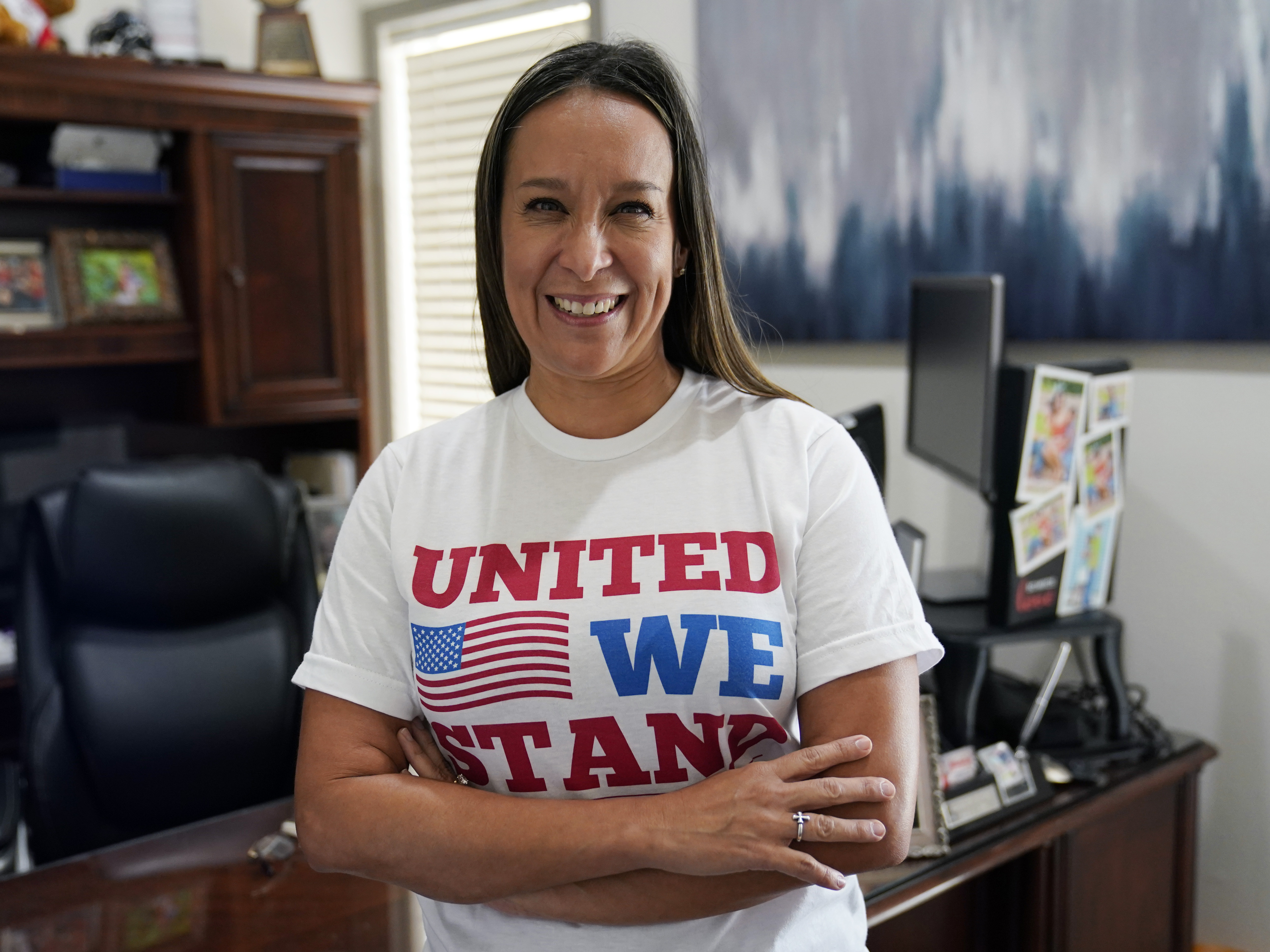 caption: Republican Monica De La Cruz-Hernandez flipped the 15th House Congressional District in one of Texas' only remaining competitive districts. In this file photo, she talks in her office in Alamo, Texas, July 8, 2021.