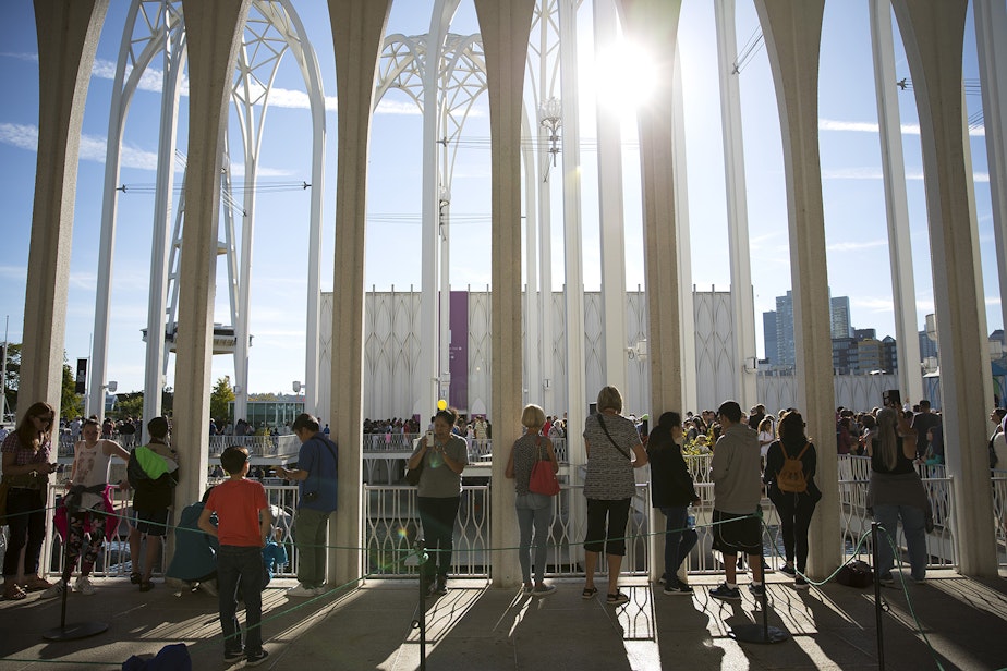 caption: Museum goers test out their eclipse glasses on Monday, August 21, 2017, at the Pacific Science Center before the start of the solar eclipse, in Seattle.