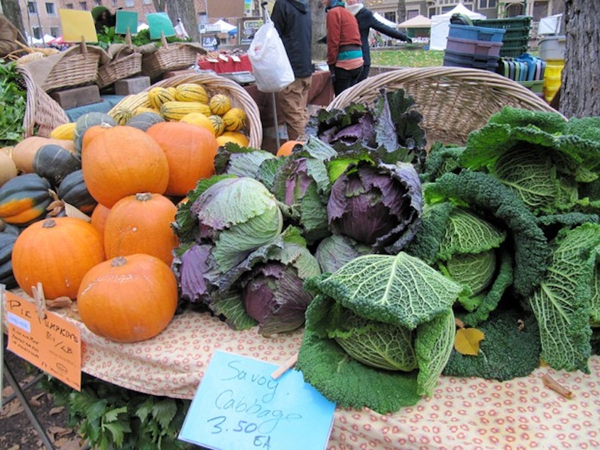 caption: <p>An array of fresh vegetables is displayed on a table at a farmer's market.&nbsp;</p>