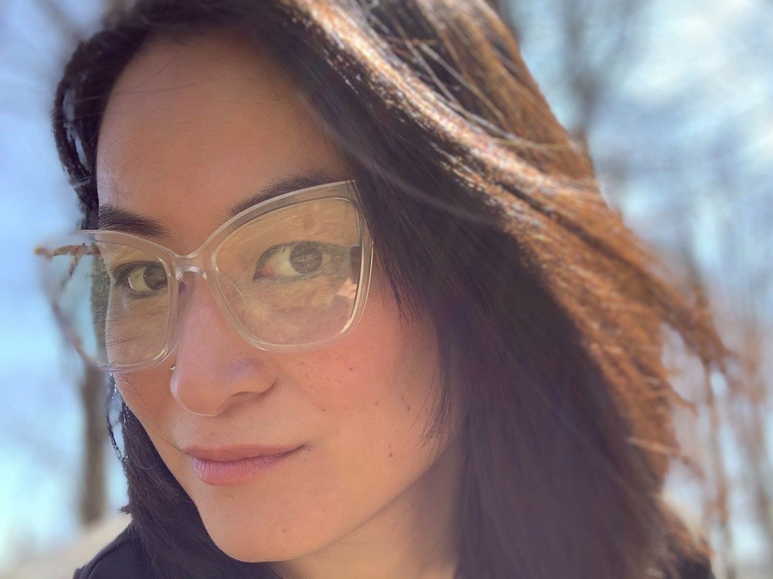 caption: Sunny Reed, who was adopted from South Korea into a white American family, says sharing that she's adopted makes some people question whether she knows the actual Asian experience.