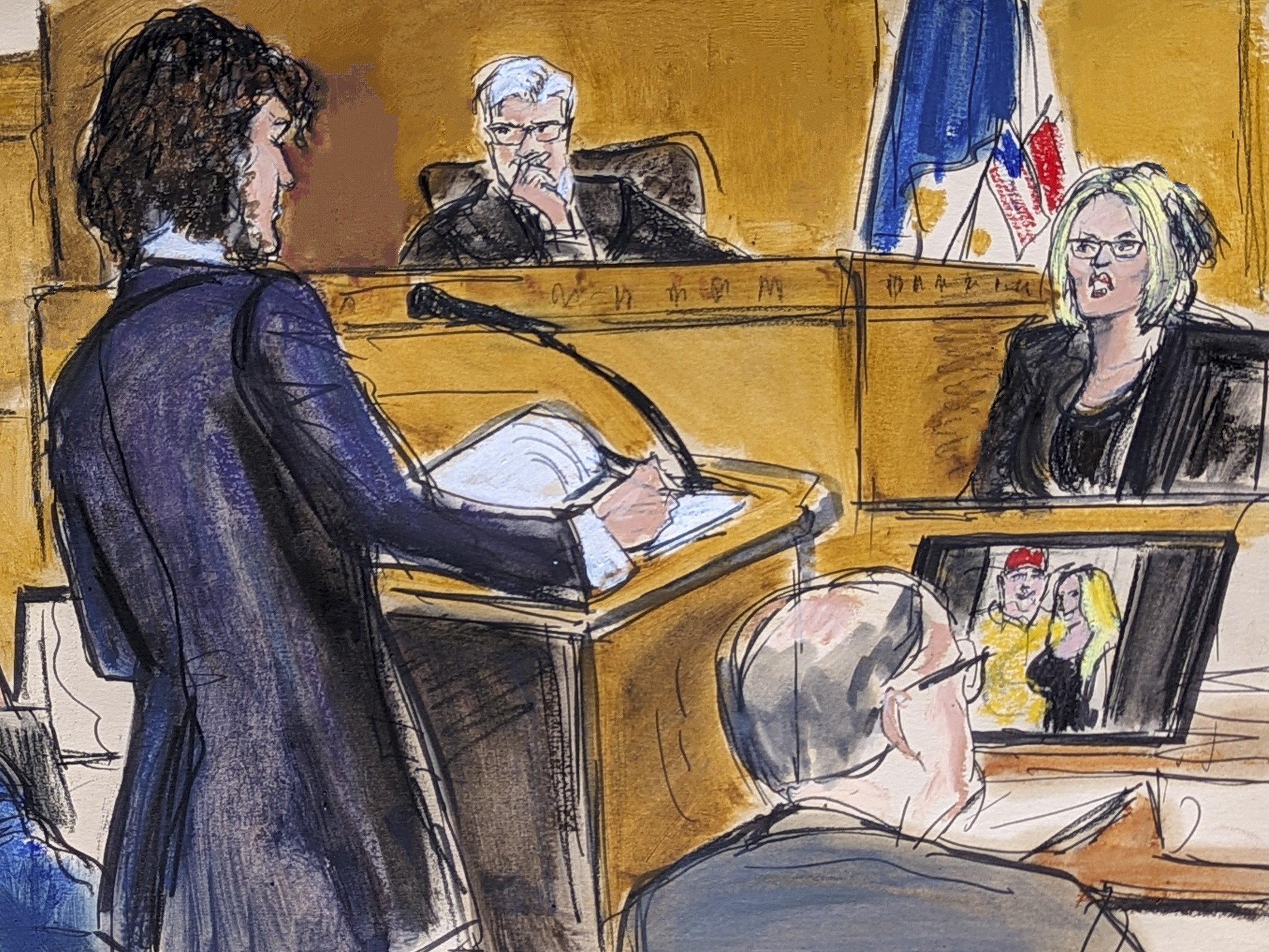 caption: Judge Juan Merchan presides over proceedings as Stormy Daniels, far right, answers questions on direct examination by assistant district attorney Susan Hoffinger in Manhattan criminal court as former President Donald Trump and defense attorney Todd Blanche look on on May 7.
