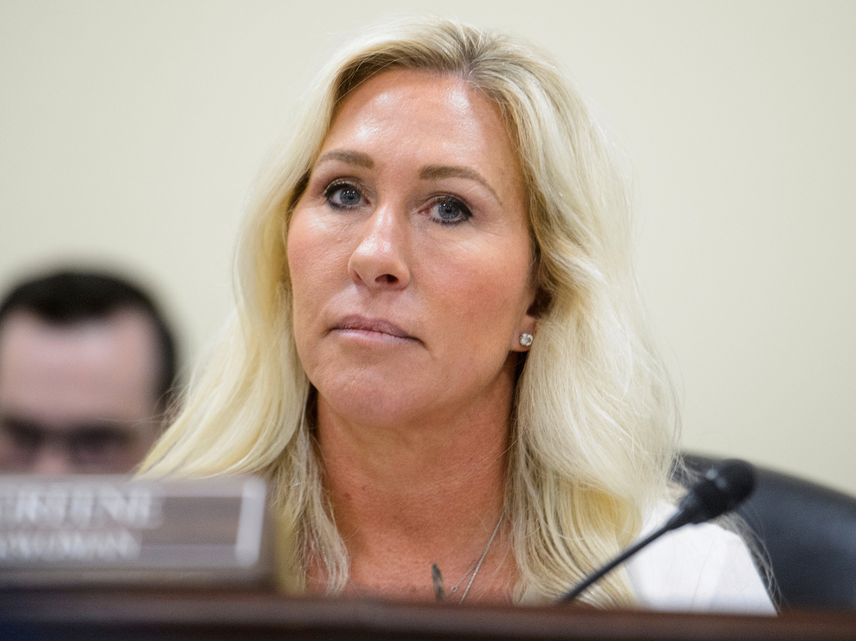 caption: Rep. Marjorie Taylor-Greene, R-Ga., presides over a House Committee hearing on Capitol Hill, Feb. 12, 2025, in Washington.