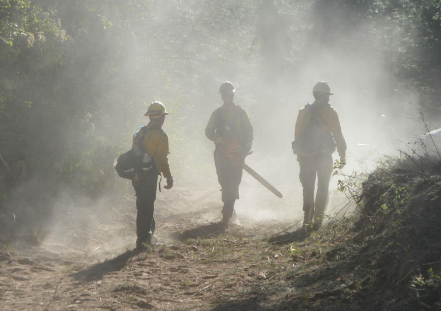 caption: Firefighters on the fire line at the Blue Creek Fire, located east of Walla Walla, Wash. It began on July 20, 2015 and consumed an estimated 6,004 acres.