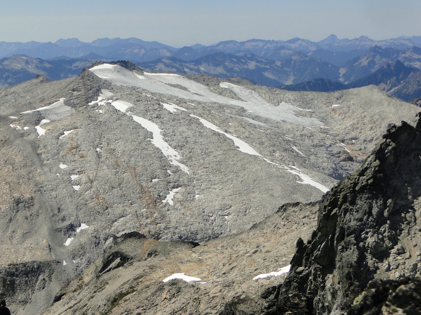 caption: The dwindling Foss Glacier atop King County's highest peak, Mount Hinman, is expected to disappear in September or next summer at the latest.