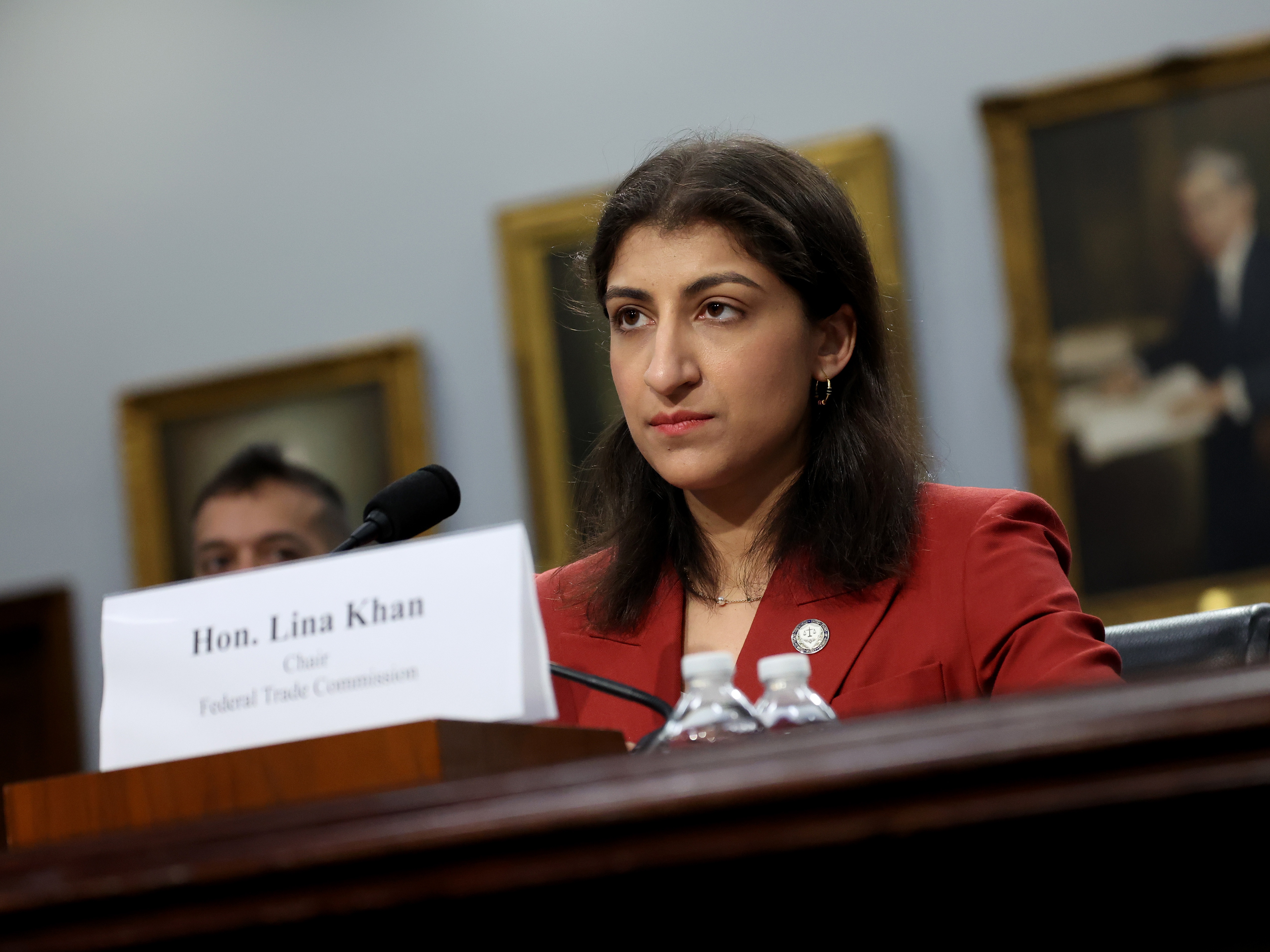 caption: "Noncompetes block workers from freely switching jobs, depriving them of higher wages and better working conditions, and depriving businesses of a talent pool that they need to build and expand," said FTC Chair Lina Khan when the noncompete ban was introduced.