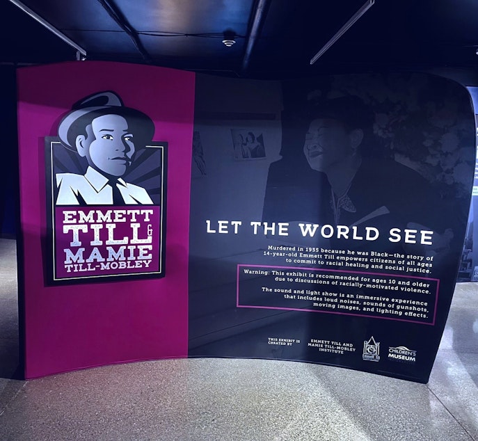 caption: The new exhibit “Emmett Till & Mamie Till-Mobley: Let the World See” explores Till’s life and death, and how his mother’s decision to hold an open-casket funeral displaying her son’s mutilated body generated worldwide attention and outrage over racial violence faced by Black Americans in the Jim Crow South.