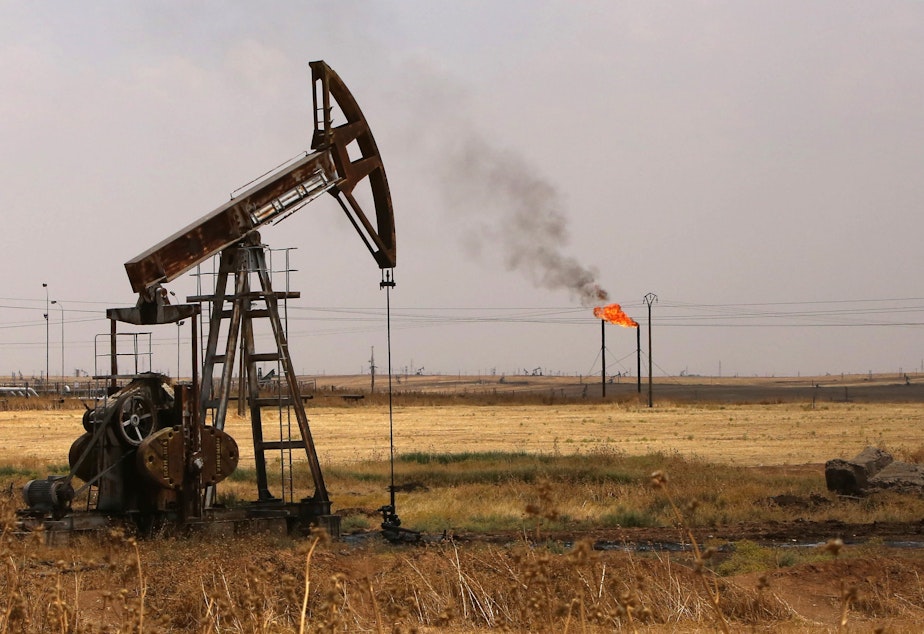 caption: Oil well pumps are seen in Syria's northeastern Hasakeh province in 2015. President Trump is renewing his push for U.S. control of Syrian oil.