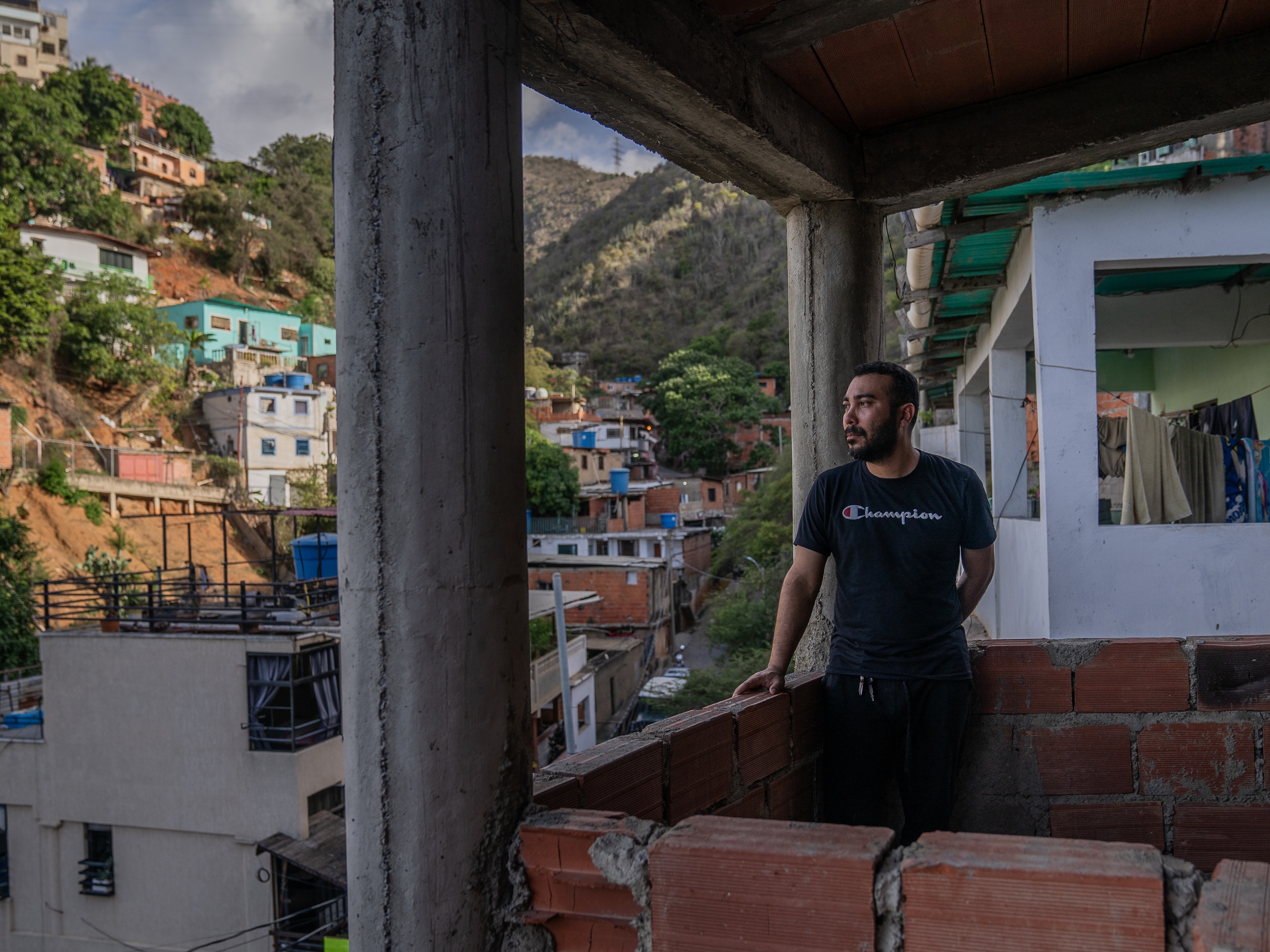 caption: Rafaias Villan, 38, in La Guaira, Catia la Mar a barrio right outside of Caracas. Rafaias is considering leaving Venezuela following the disputed  election results last month. 