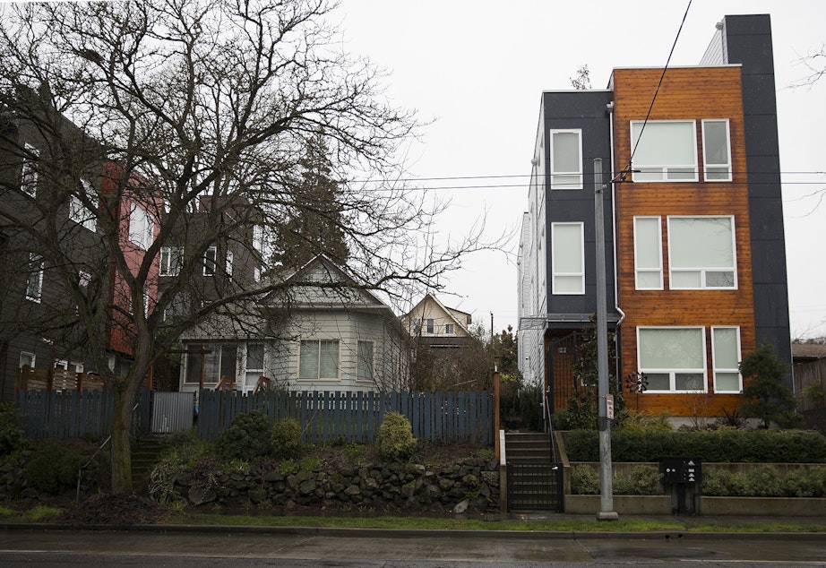 caption: Homes near the intersection of 23rd Avenue East and East Thomas Street in Seattle. 
