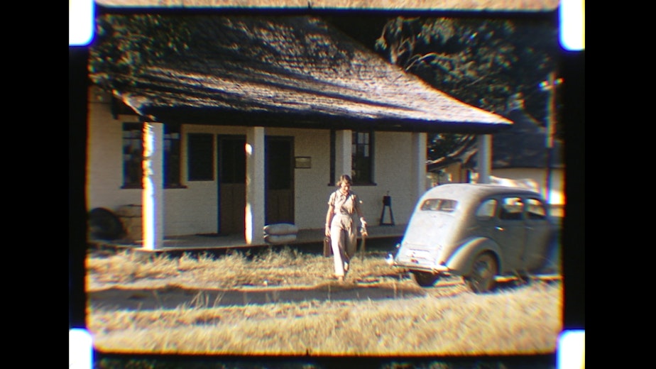 caption: Anne Innis Dagg and her trusty Ford Prefect in South Africa in 1956.