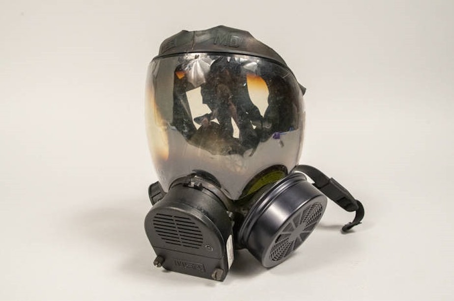 caption: Gas mask used by Captain Jim Pugel during the World Trade Center (WTO) conference and protests in Seattle, 1999