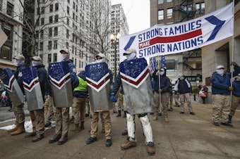 caption: The white nationalist group Patriot Front attends the March For Life on in Chicago on Jan. 8.