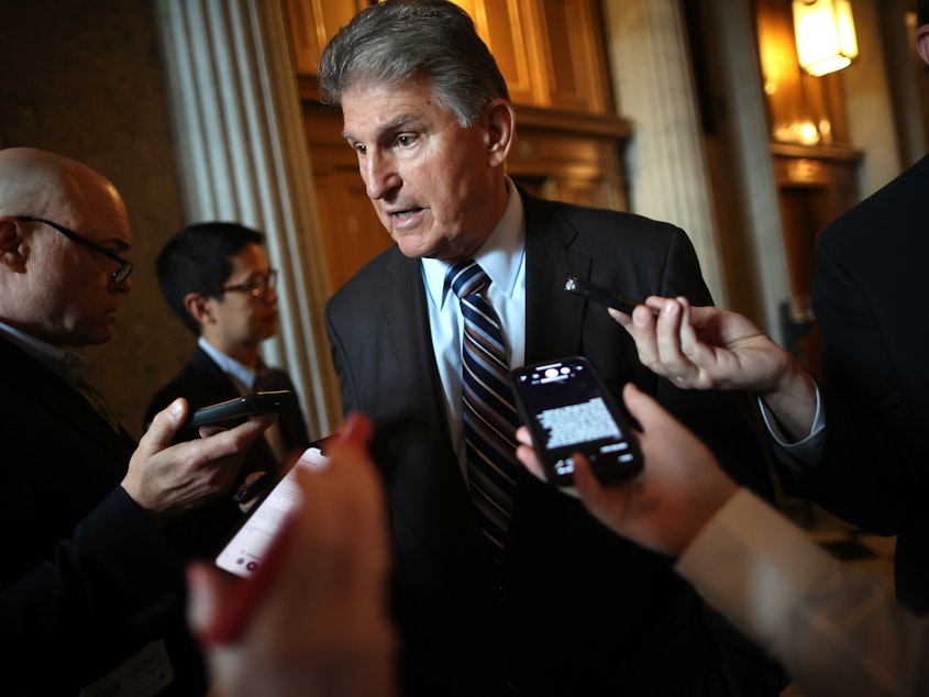 caption: West Virginia Sen. Joe Manchin, seen here at the U.S. Capitol on May 28, has publicly said he will not support H.R.1, a sweeping set of voting rights measures.