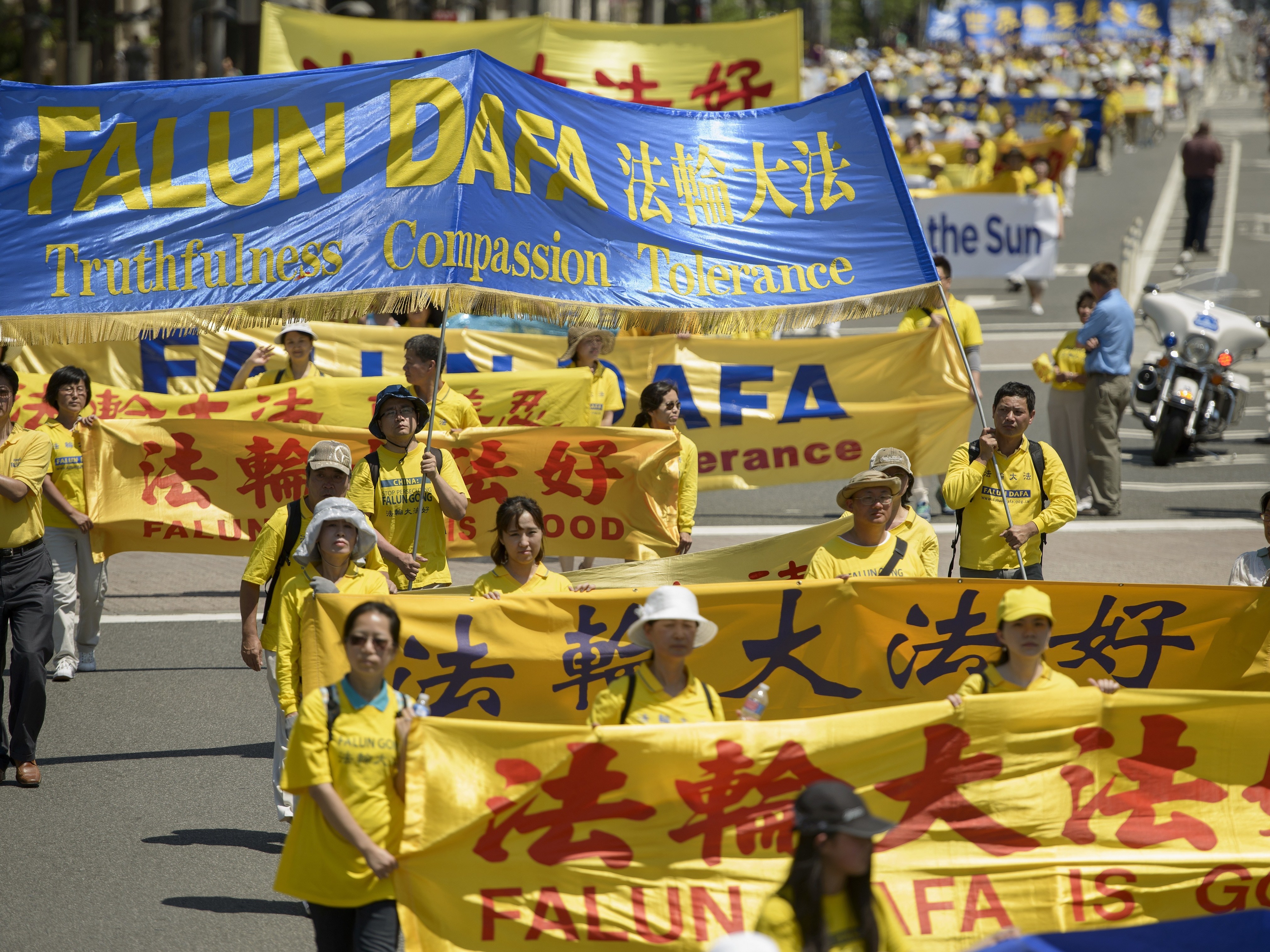 caption: Falun Gong supporters marched from Capitol Hill to the Washington Monument in July 2015 in Washington, D.C.