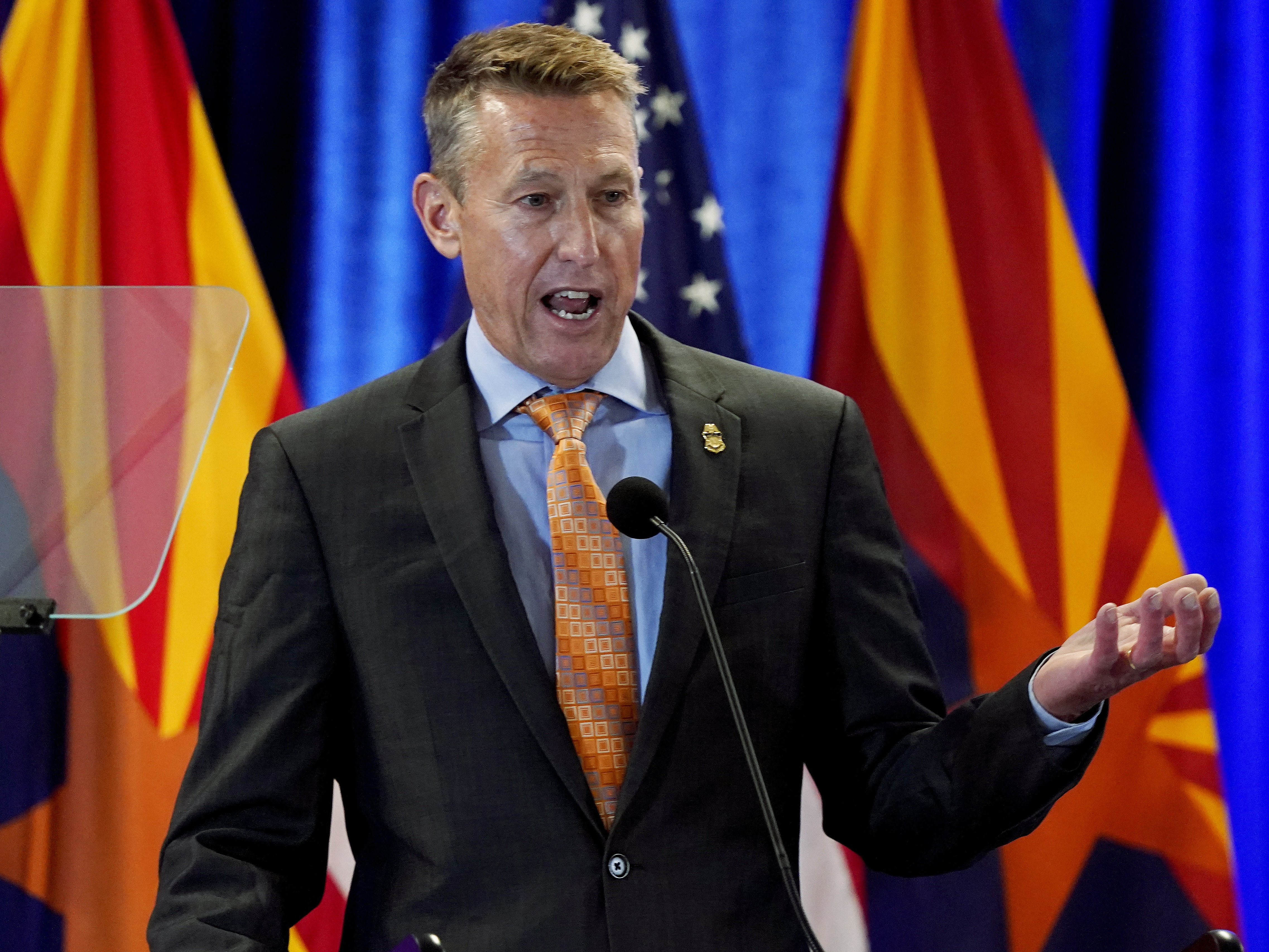 caption: Rodney Scott, former chief of the U.S. Border Patrol, speaks following a border tour with former Vice President Mike Pence, June 13, 2022, in Phoenix.