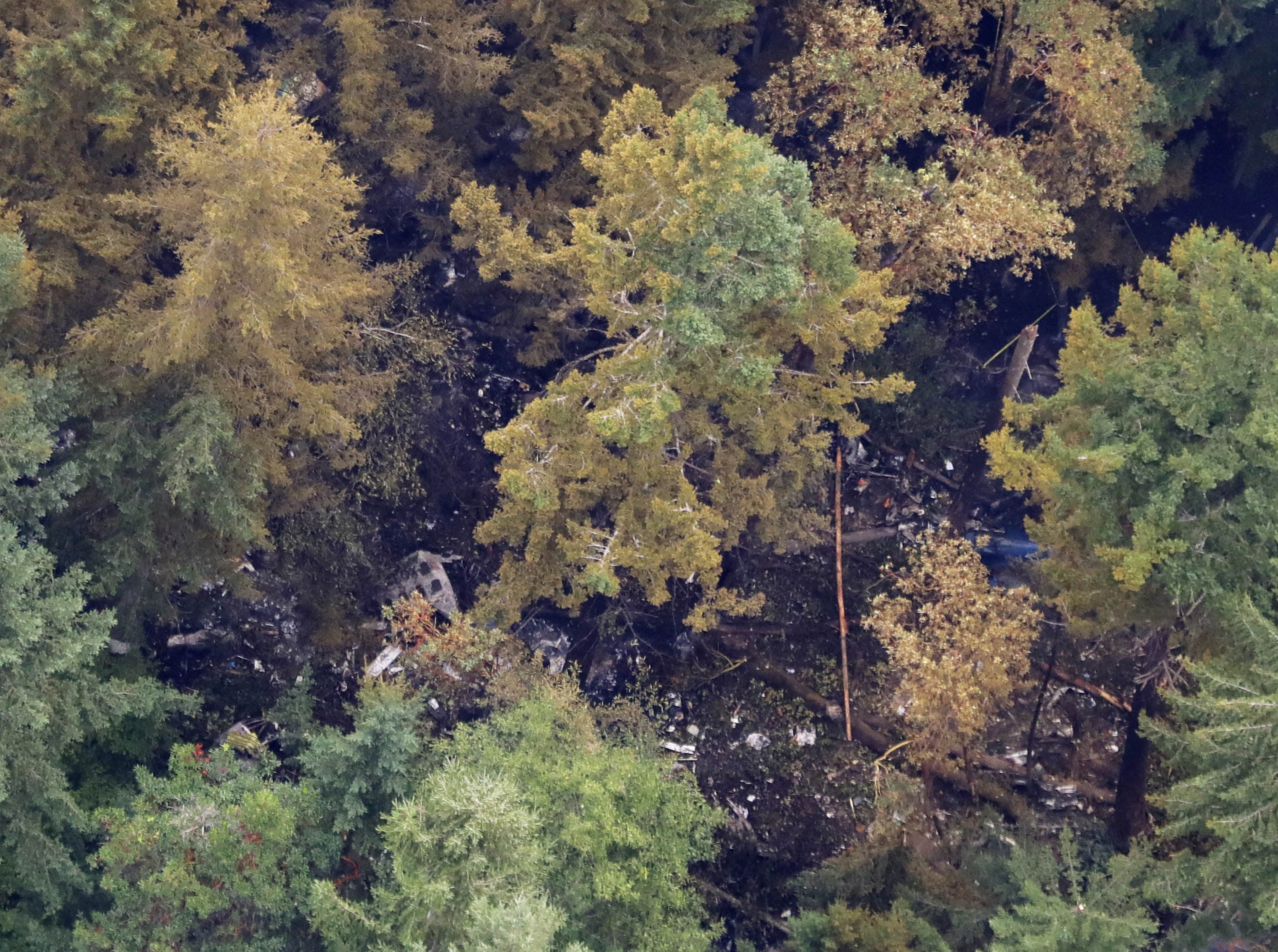 caption: The site on Ketron Island in Washington state where an Horizon Air turboprop plane crashed Friday after it was stolen from Sea-Tac International Airport is seen from the air, Saturday, Aug. 11, 2018, near Steilacoom, Wash. 