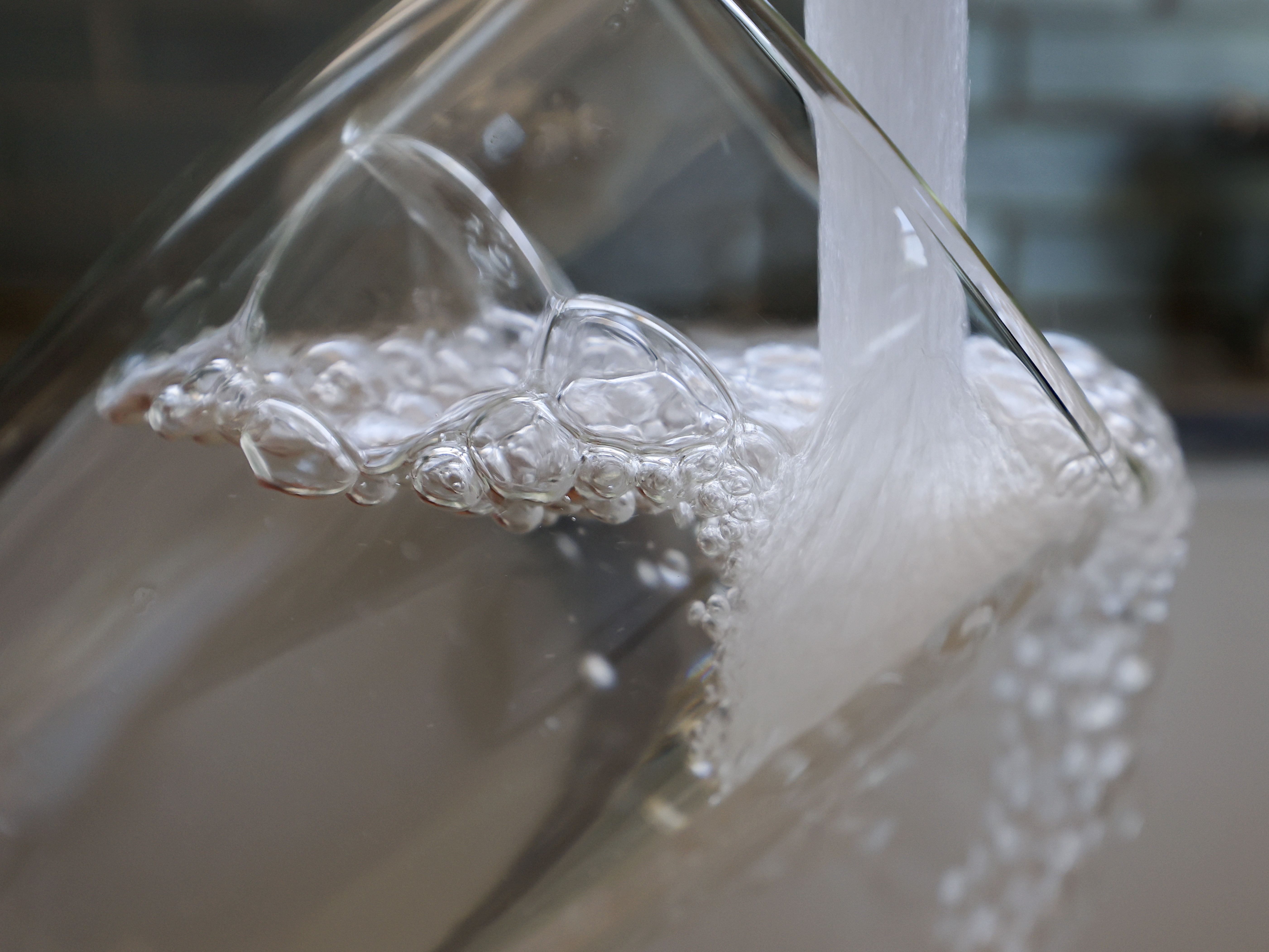 caption: A supply disruption is leading some water systems to reduce the amount of fluoride in drinking water.