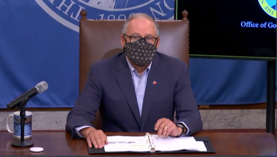 caption: Washington state Governor Jay Inslee presents new school reopening guidelines at a press conference on December 16, 2020.