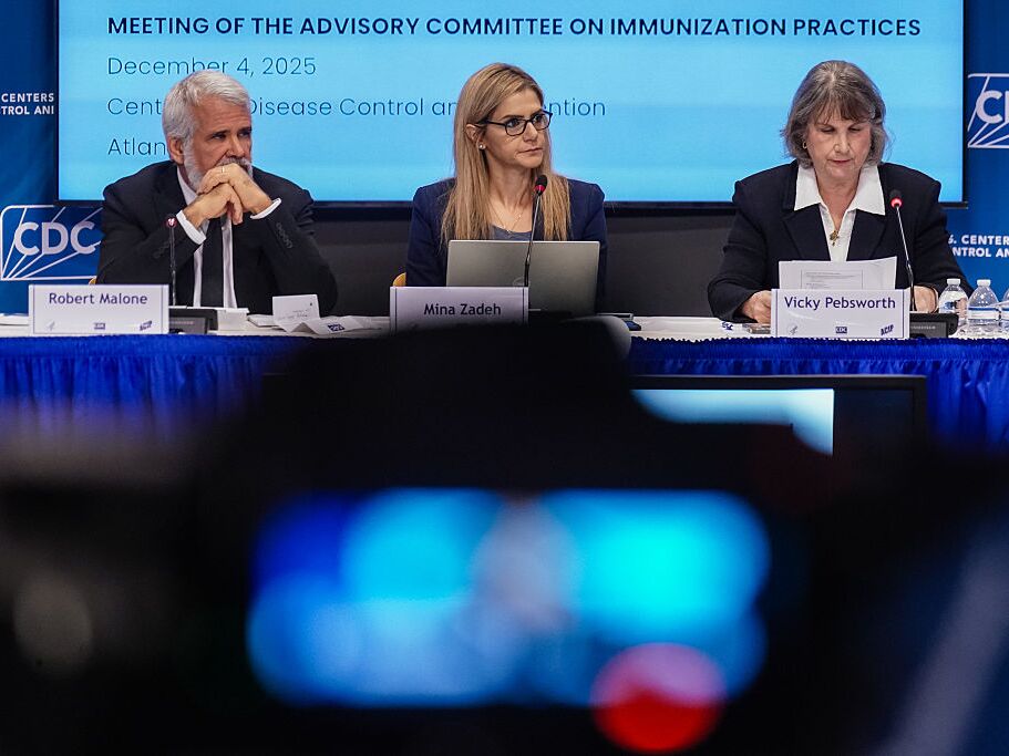 caption: Members of the CDC Advisory Committee on Immunization Practices (ACIP) are seen during a meeting at CDC headquarters on December 4, 2025 in Atlanta, Ga.