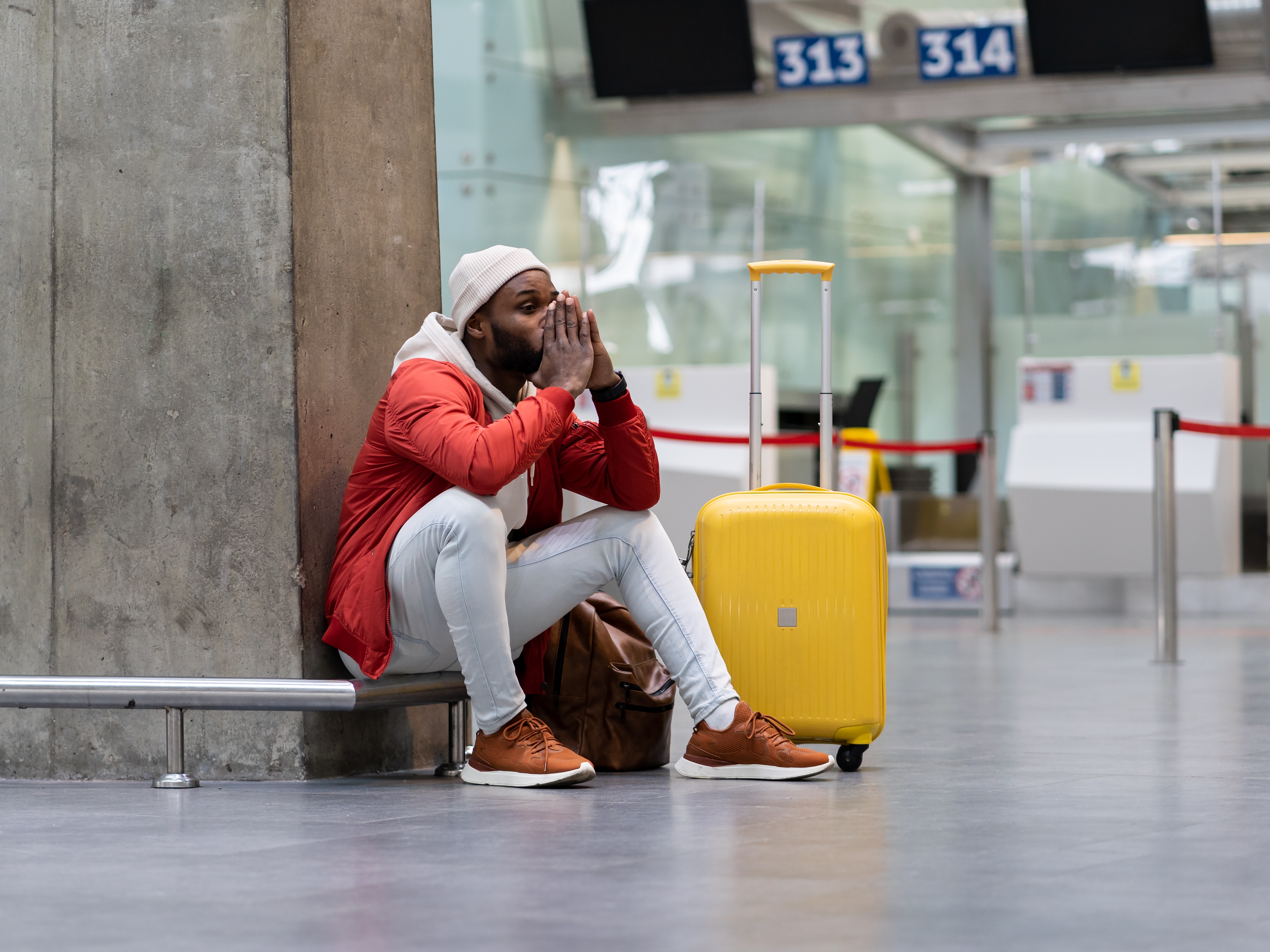 caption: If holiday air travel makes your palms sweat and your heart race, there are science-backed coping mechanisms that can help you manage the stress.