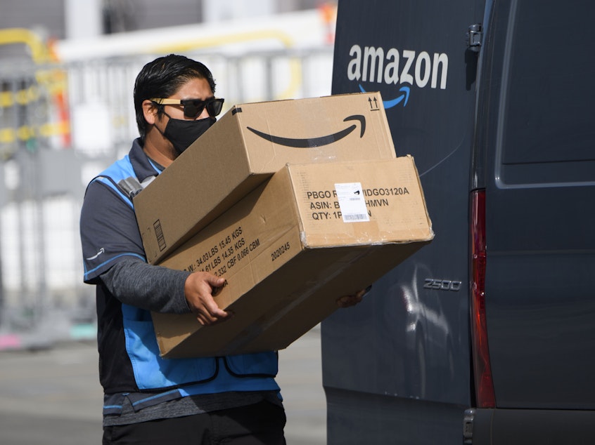 caption: The Teamsters, which represents 1.4 million workers nationwide, introduced a resolution making organizing Amazon workers across the country a top priority.