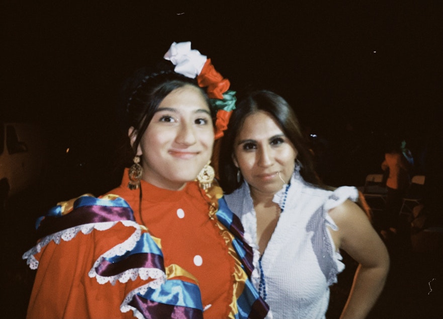 caption: Eva Solorio (left) and her mom, Ana Iglesias, on Eva's 15th birthday. Eva is wearing a traditional dress from her mom’s home state, Jalisco, Mexico.