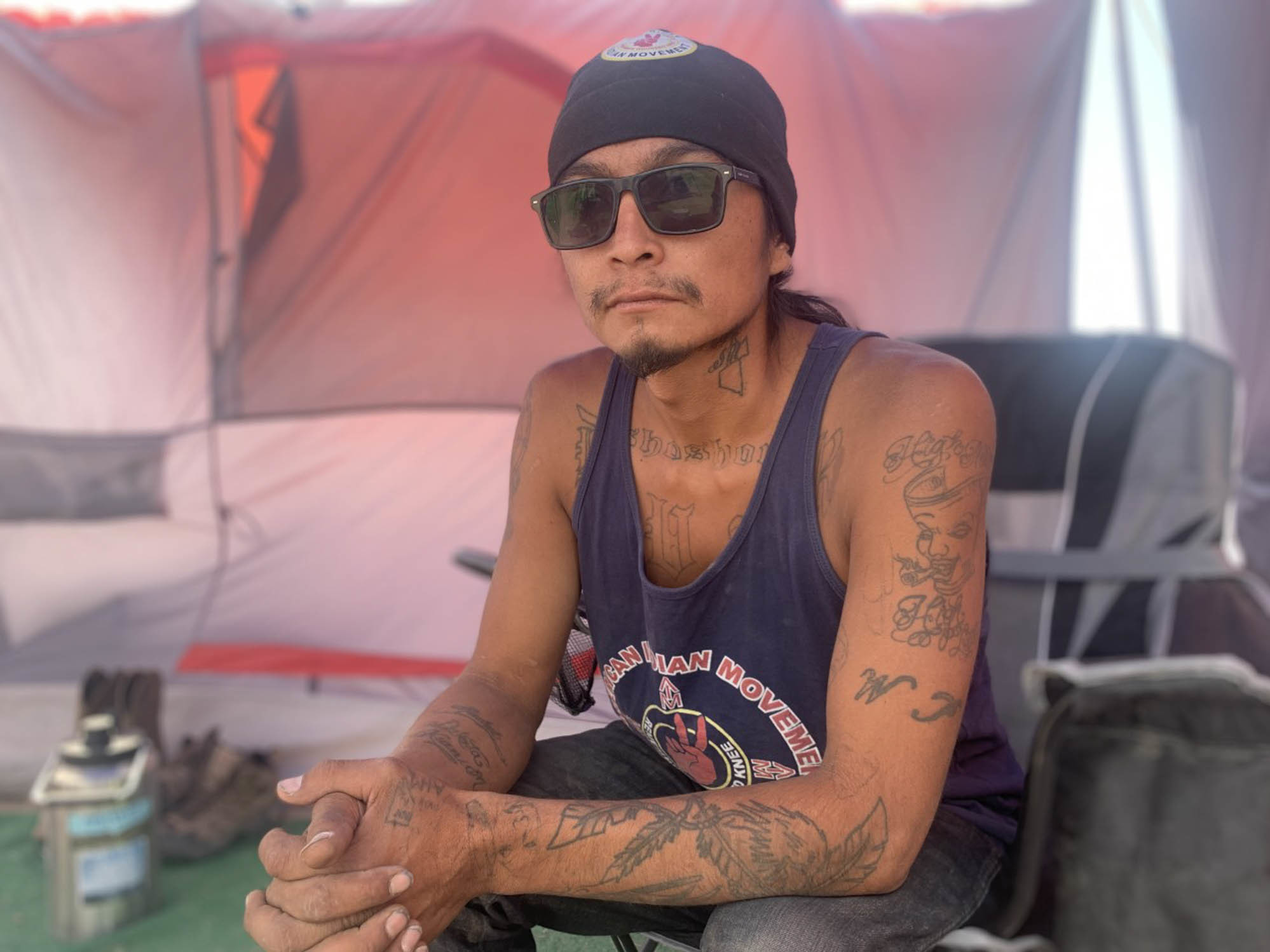 caption: Gary McKinney of the Duck Valley Reservation says he plans to stay camping at a proposed site of a lithium mine long as it takes to prevent it from being developed.