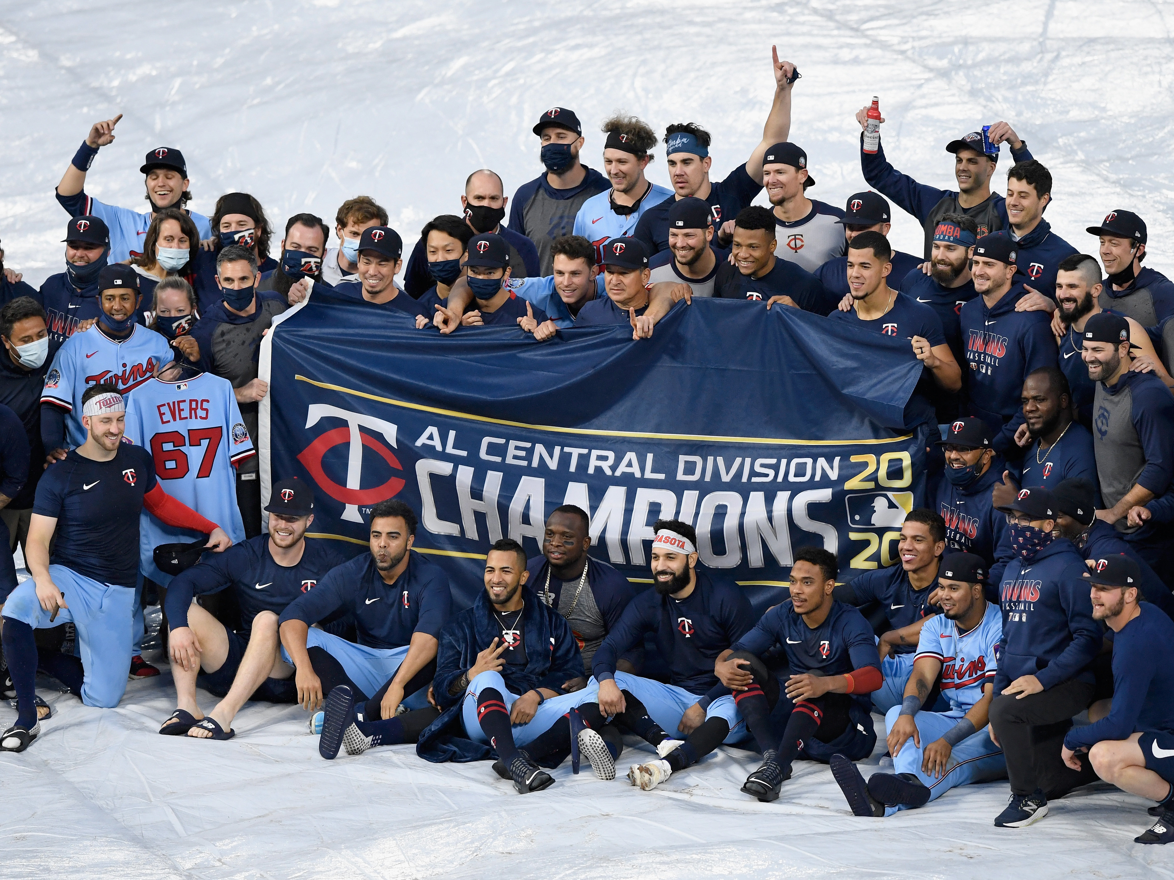 caption: The Minnesota Twins celebrate being the American League Central Division Champions after the game against the Cincinnati Reds on September 27, 2020 in Minneapolis.