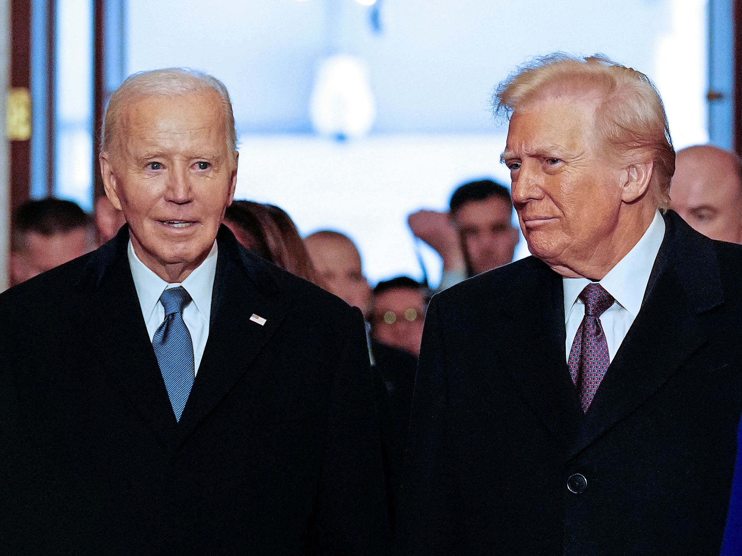 caption: Then-President Joe Biden and President-elect Trump arrive for Trump's inauguration ceremony in January. Trump said Wednesday he had commissioned an investigation into his predecessor's administration.