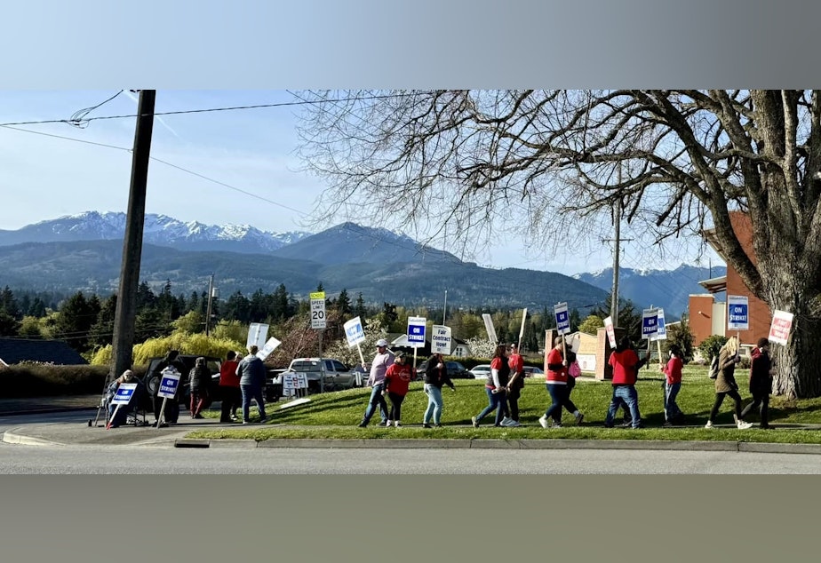 caption: The Port Angeles School District's 135 paraprofessionals have been on strike for four days.