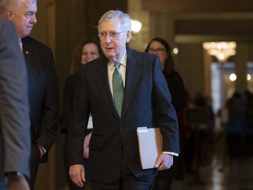 caption: Senate Majority Leader Mitch McConnell, R-Ky., photographed at the Capitol in Washington in March, announced Thursday that he would introduce legislation to raise the minimum age for purchasing tobacco products to 21.