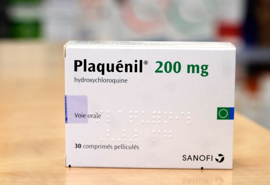 caption: A pack of Plaquenil, (Hydrochloroquine) is displayed in a Parisian pharmacy on Tuesday in Paris, France. Chloroquine or Hydroxychloroquine, is now one treatments being evaluated in clinical trials as a possible preventative or treatment for COVID-19.