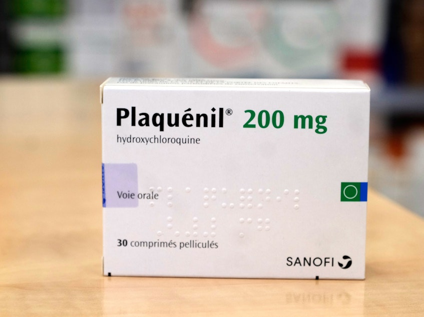 caption: A pack of Plaquenil, (Hydrochloroquine) is displayed in a Parisian pharmacy on Tuesday in Paris, France. Chloroquine or Hydroxychloroquine, is now one treatments being evaluated in clinical trials as a possible preventative or treatment for COVID-19.