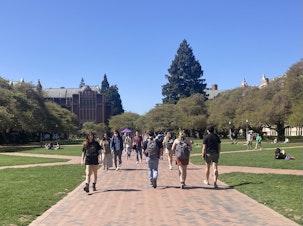 caption: People on the University of Washington campus broke out their shorts and T-shirts on April 28, 2023, the first 70-plus-degree day of the year. 